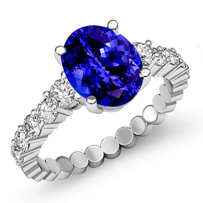 Prong Set Classic Side Stone Oval diamond engagement Ring in 14k Gold White